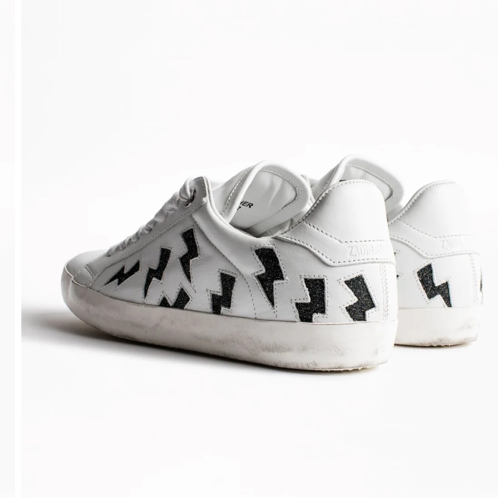 White and reflective lightning bold shoes! Super different and comfy